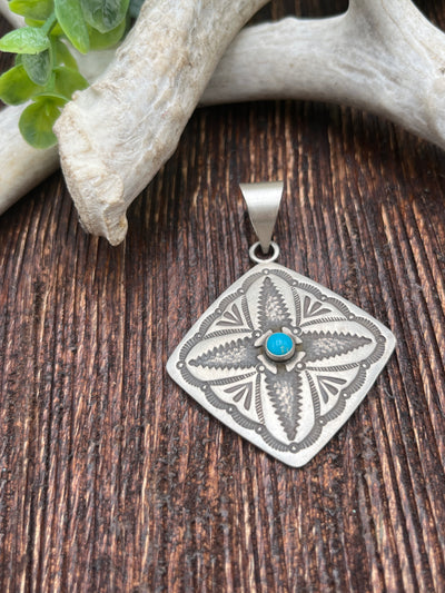 Flagstaff Stamped Sterling Diamond Shaped Pendant With Turquoise Center