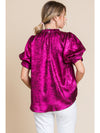 Kia Metallic top with frilled neck